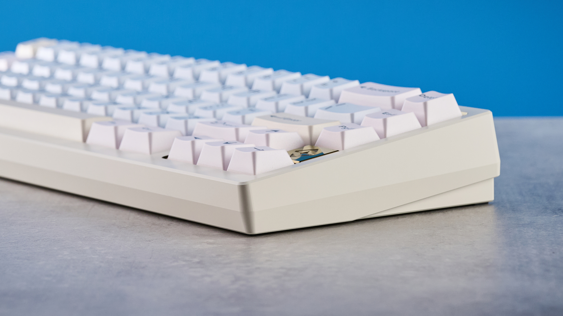 Wobkey Zen 65 mechanical keyboard photographed in front of a blue background