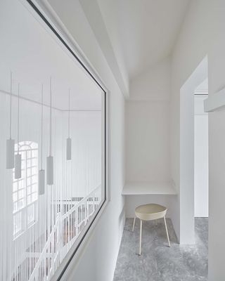 minimalist white interior at InJoy Snow Hotel Bangkok by HAS design and research