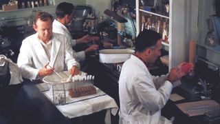 Technicians in a bacteriology laboratory in San Francisco, isolate the bacteria Yersinia pestis during a plague study in 1965.
