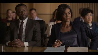 Sean Patrick Thomas and Emayatzy Corinealdi as Brayden and Jax sitting in court in Reasonable Doubt
