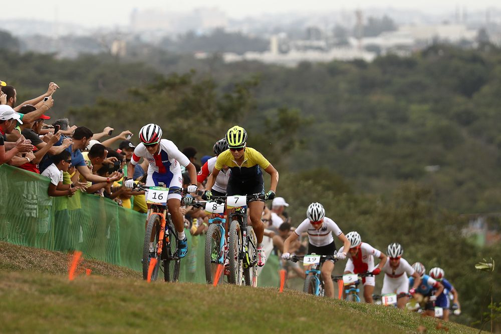 The women's field hits the climb ont he first lap of the Olympic XC race.