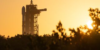 A SpaceX Falcon 9 rocket carrying NASA's Imaging X-ray Polarimetry Explorer (IXPE) space telescope stands at the launch pad before a Dec. 9, 2021, flight opportunity.