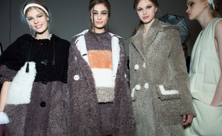 Female models wearing grey and black fluffy jackets from the Fendi A/W 2015 collection