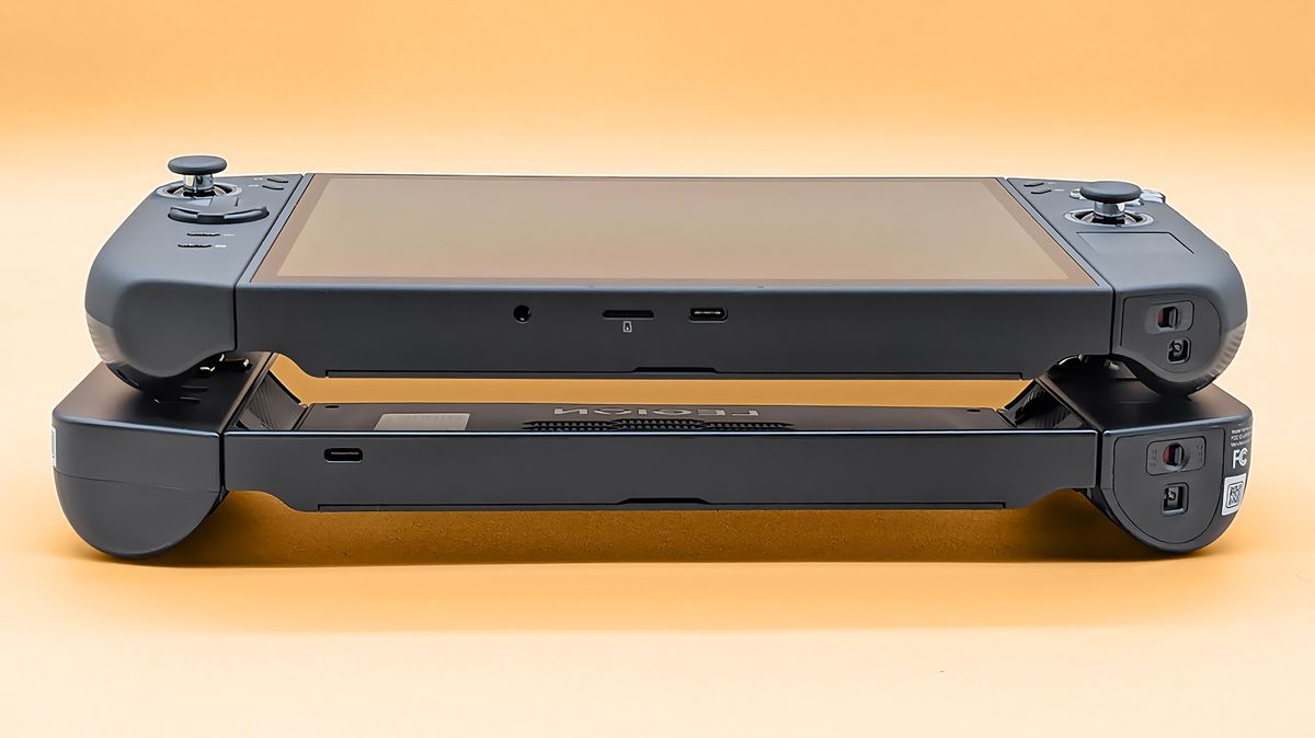 The Lenovo Legion Go 2 on the original Legion Go. The camera is angled so you can view the bottom of these devices.