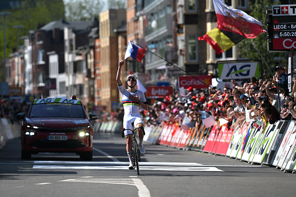Tadej Pogacar of Slovenia and UAE Team Emirates - XRG celebrates at finish line as race winner and dedicates the victory to the deceased cyclist Cristian Camilo Munoz during the 112th Liege - Bastogne - Liege 2026