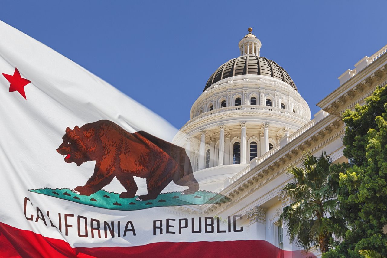 picture of California state capitol with flag