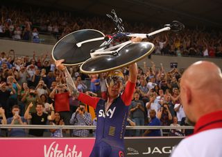 Bradley Wiggins celebrates breaking the UCI Hour Record at Lee Valley Velopark Velodrome in London.