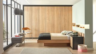 Japandi bedroom with wooden fitted wardrobes and wall-to-ceiling windows