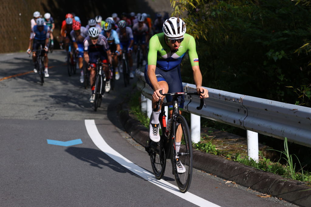 OYAMA, JAPAN - JULY 24: Tadej Pogacar of Team Slovenia attack in the breakaway during the Men&amp;amp;apos;s road race at the Fuji International Speedway on day one of the Tokyo 2020 Olympic Games on July 24, 2021 in Oyama, Shizuoka, Japan. (Photo by Tim de Waele/Getty Images)
