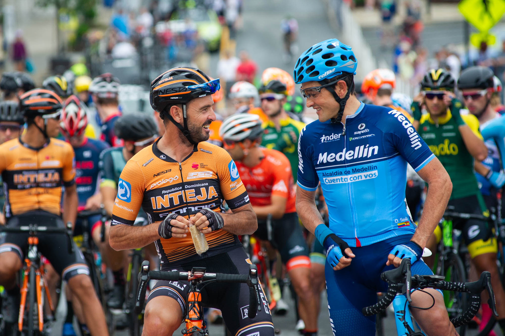 Oscar Sevilla (Medellin) and Francisco Mancebo (Inteja) catch up on the start line before the road race at the Winston-Salem Cycling Classic