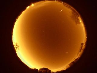 This fireball was captured on Nov. 10, 2011 during the 2011 Leonid meteor shower. This false light image was taken using the All Sky Sentinel camera at the Sandia National Laboratories in Sonora, Mexico.