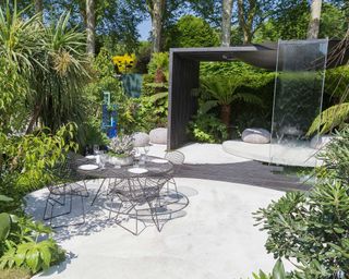 pergola with waterfall in 'VTB Capital Garden – Spirit of Cornwall', designed by Stuart Charles Towner with Studio Evans Lane for RHS Chelsea Flower Show 2018