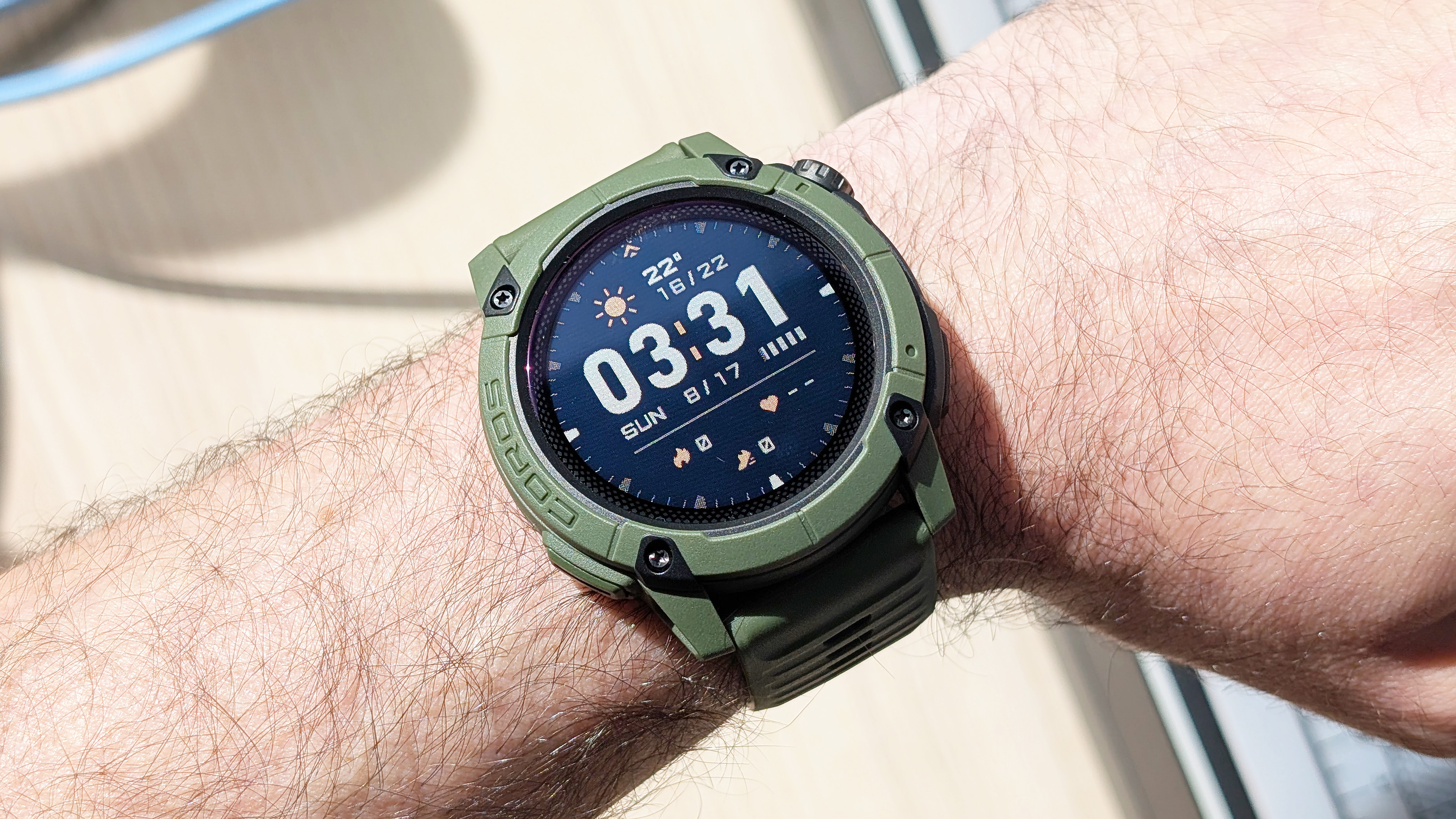 Close-up of the Coros Nomad rugged smartwatch in dark green
