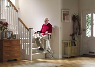 a stairlift with a curved portion at the base