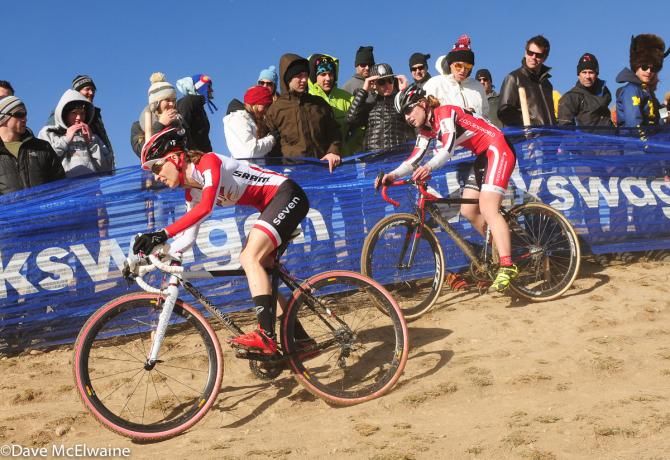 Mo Bruno-Roy (Bobs Red Mill) riding off-camber with Emma White taking the high line