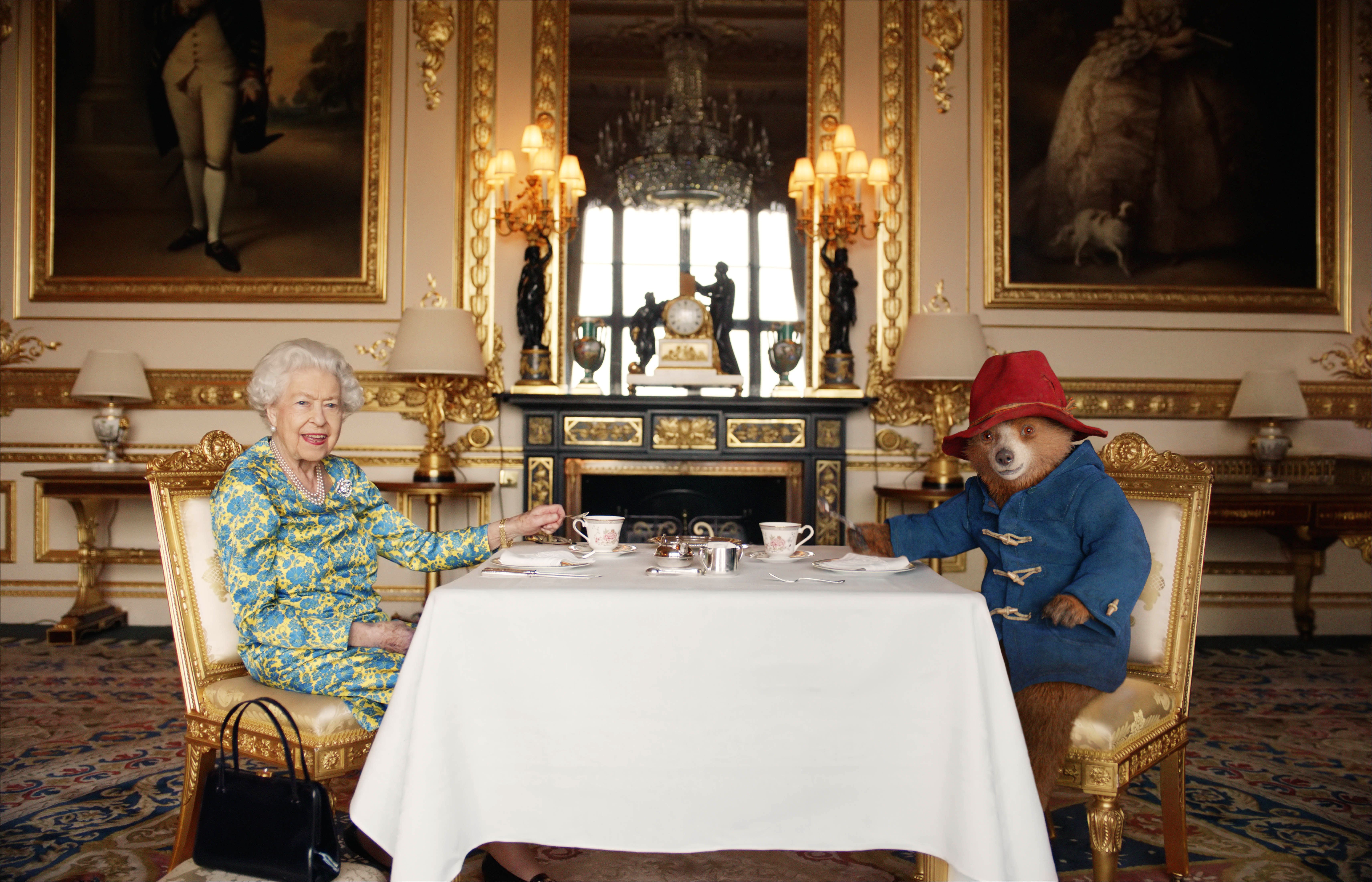 Queen Elizabeth. having tea with Paddington