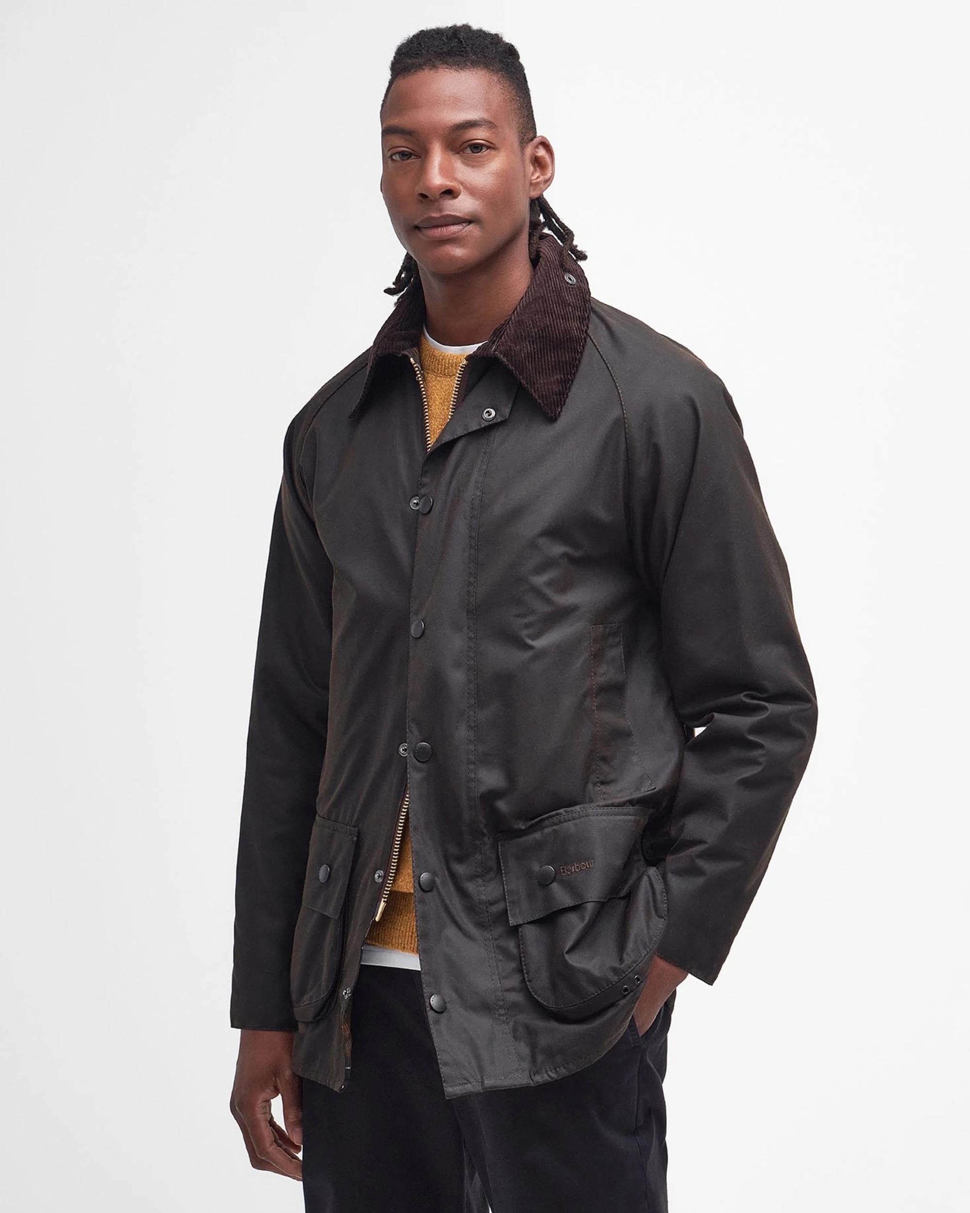 Model wearing a Barbour Beaufort waxed jacket