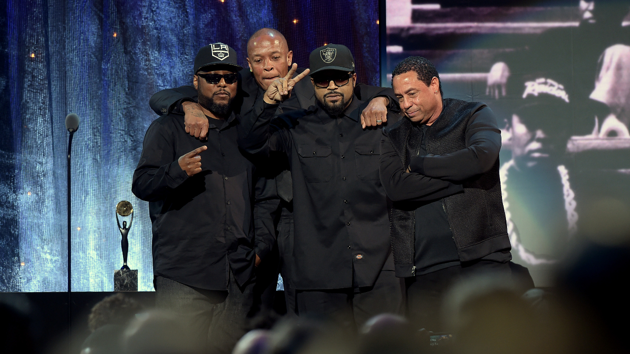 Ice Cube with the surviving members of N.W.A. on stage at the rock and roll hall of fame in 2016