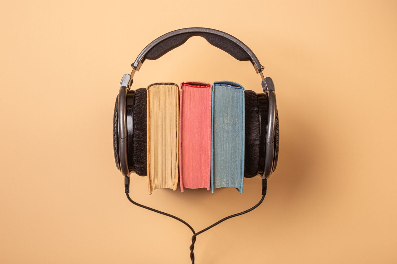 Headphones over a stack of books