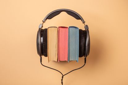 Headphones over a stack of books