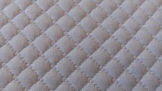 Simba mattress with closeup on stitching