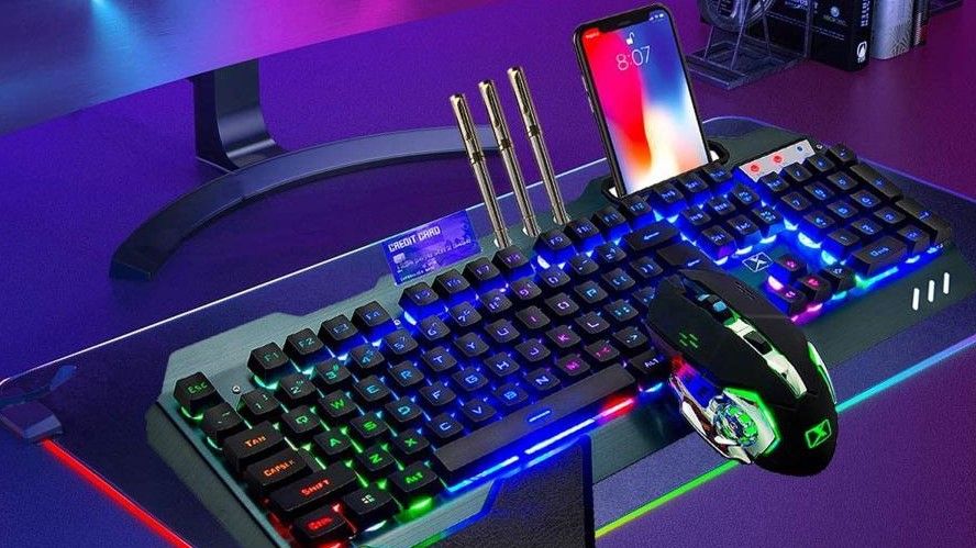 A keyboard with pen holders.