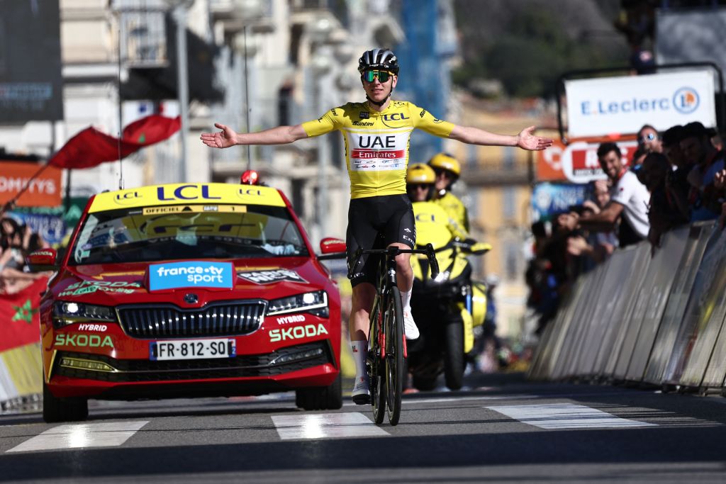 UAE Team Emirates Slovenian rider Tadej Pogacar wearing the overall leaders yellow jersey celebrates as he crosses the finish line of the 8th and final stage of the 81st Paris Nice cycling race 1175 km between Nice and Nice on the Promenade des Anglais of the French riviera city of Nice southeastern France on March 12 2023 Photo by AnneChristine POUJOULAT AFP Photo by ANNECHRISTINE POUJOULATAFP via Getty Images