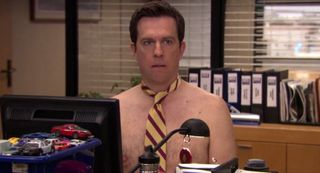 Andy with a tie and no shirt in The Office