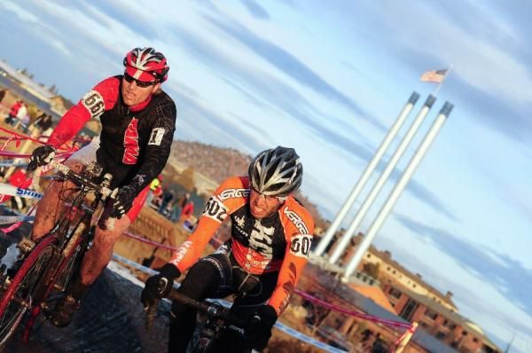 Adam Mills (KCCX) with the Old Mill smokestacks in the background