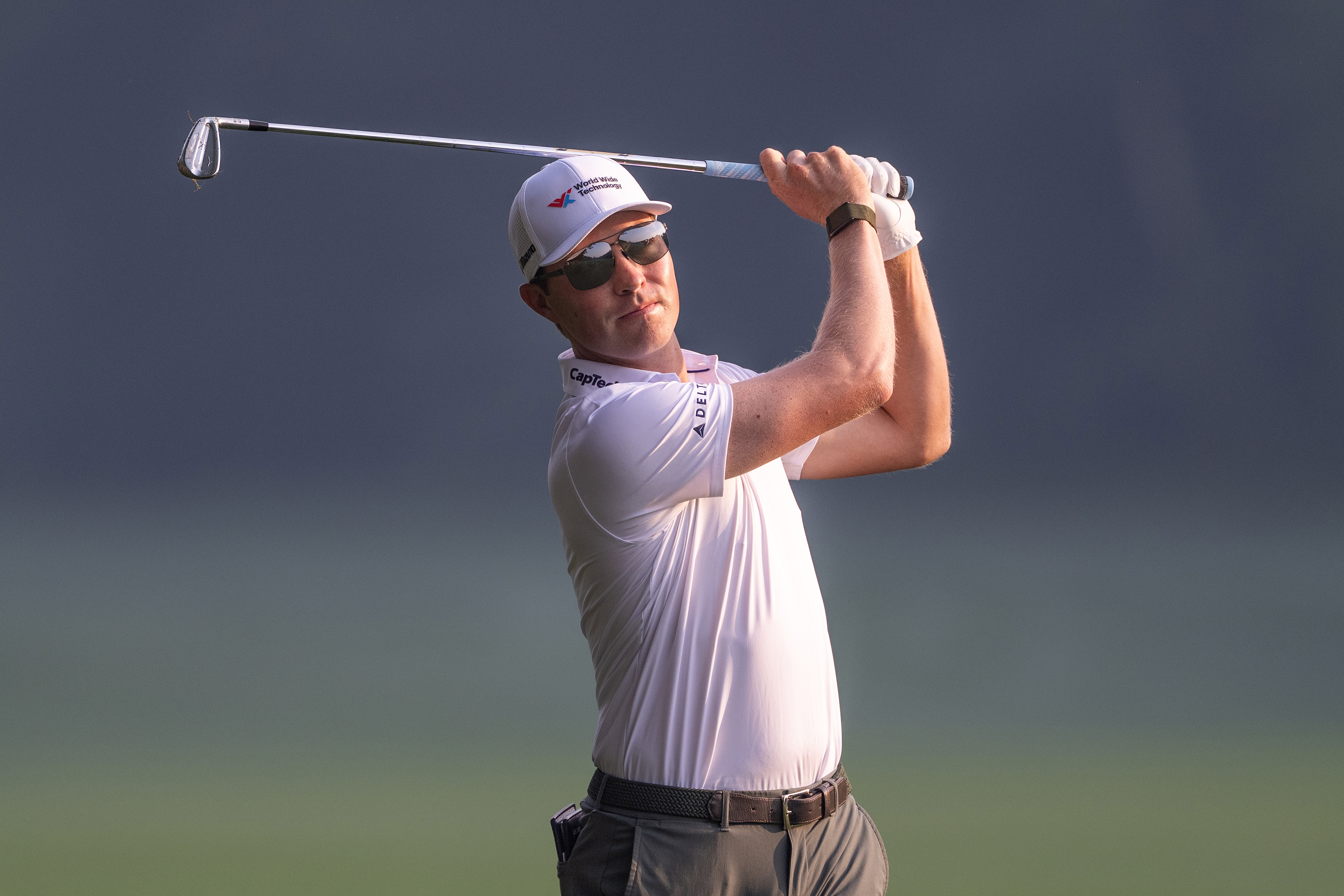 Ben Griffin hits an iron shot