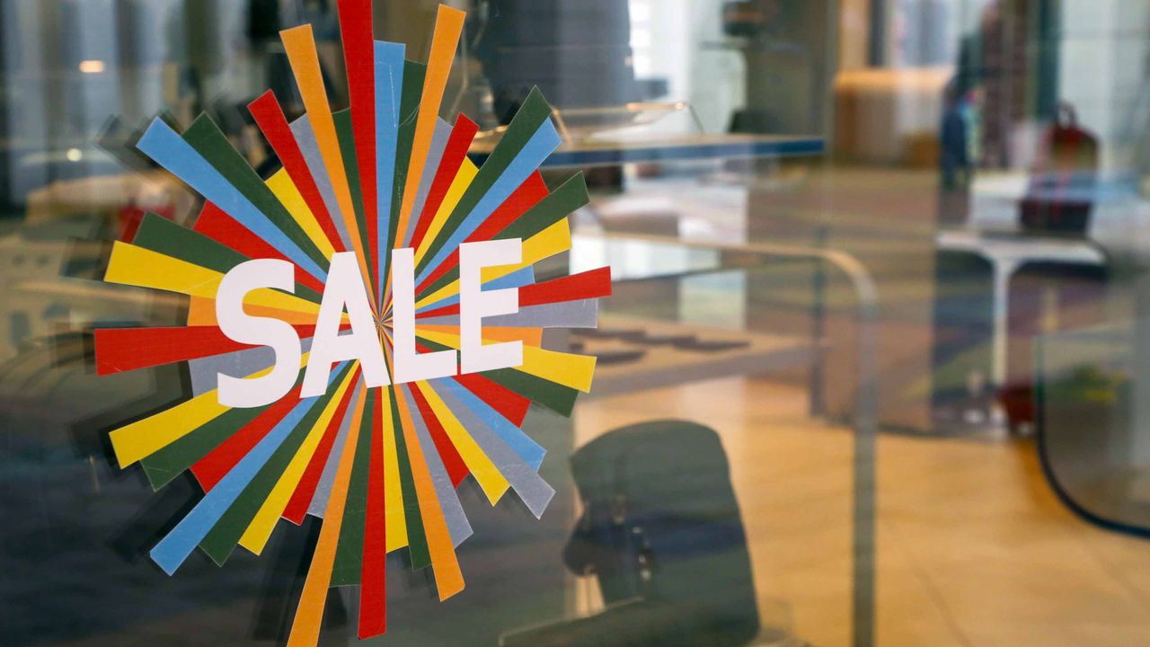 multi-colored sale sign