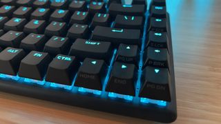 Close up on arrow buttons and dual functions on Alienware Pro Wireless gaming keyboard