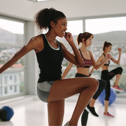 Three women doing a HIIT workout