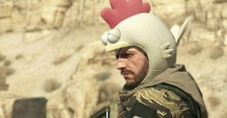 Punished "Venom" Snake looking menacingly over his shoulder to the left while wearing a silly chicken hood.