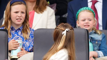 Mia Tindall, Princess Charlotte of Cambridge and Lena Tindall attend the Platinum Pageant on The Mall on June 5, 2022 in London, England. The Platinum Jubilee of Elizabeth II is being celebrated from June 2 to June 5, 2022, in the UK and Commonwealth to mark the 70th anniversary of the accession of Queen Elizabeth II on 6 February 1952.