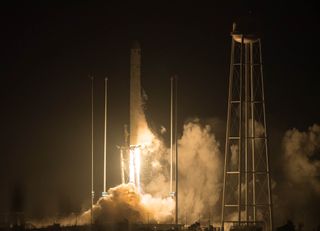 An Orbital ATK Antares rocket carrying the OA-9 Cygnus spacecraft launches from Pad-0A,at NASA's Wallops Flight Facility on Wallops Island, Virginia on May 21, 2018.