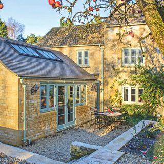 Exterior shot of a cottage with an extension