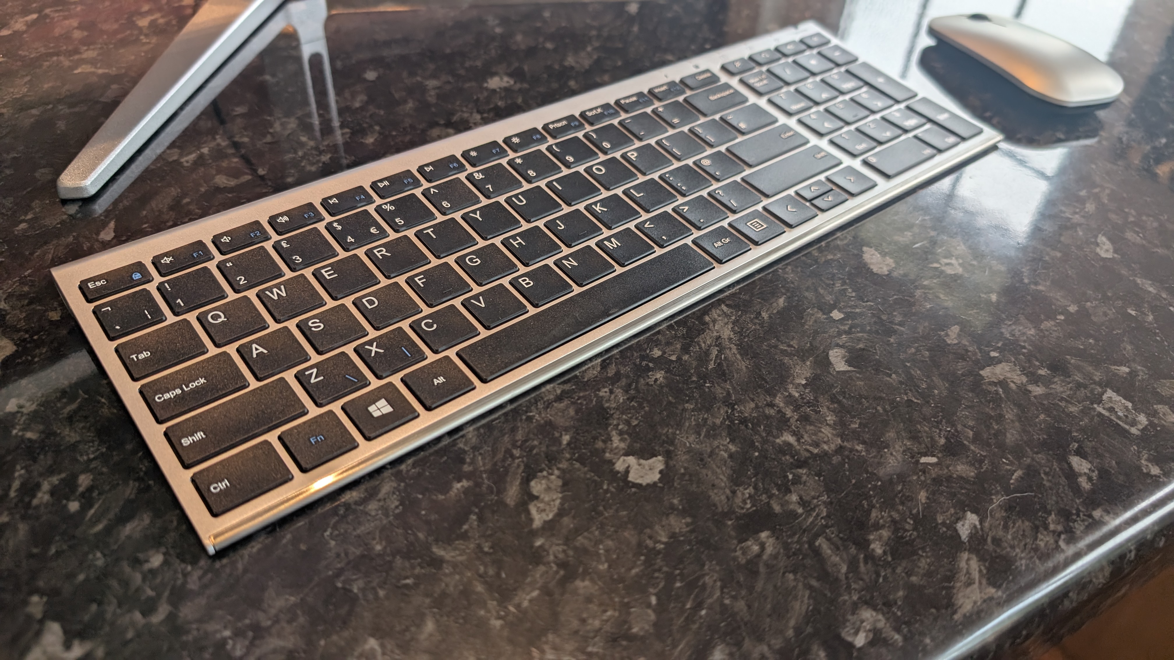The Medion Signium 27 S1 AIO desktop pictured on a marble worksurface.