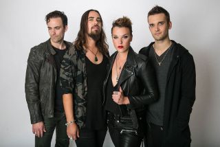 Halestorm with brother and drummer Arejay (second left)