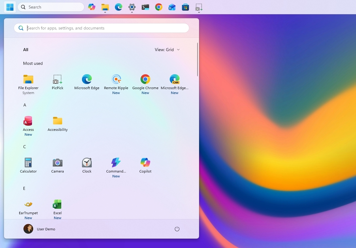 Windows 11 desktop with the taskbar located at the top of the screen.