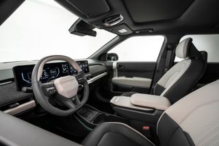 Kia EV3 electric crossover front interior