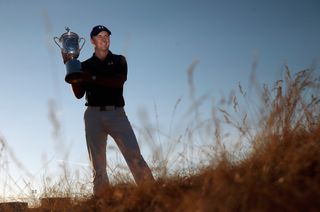 Jordan Spieth holds the US Open trophy at Chambers Bay