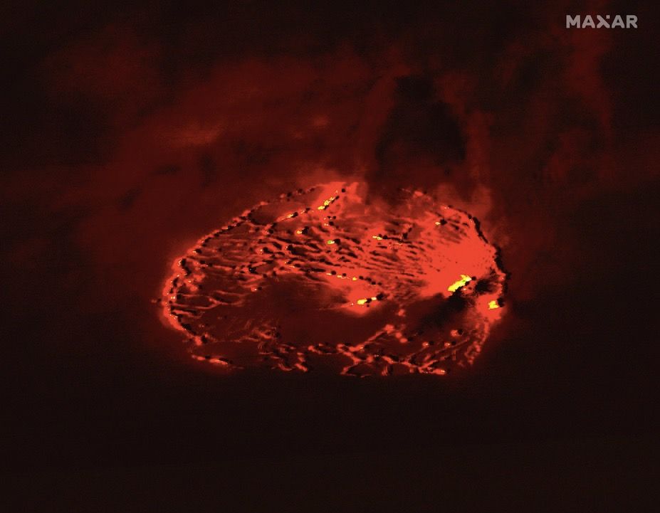 Hawaiian volcanic eruption glows in satellite photos Space