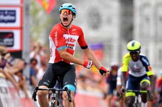 Arnaud De Lie of Belgium and Team Lotto Soudal celebrates winning a stage of Tour de Wallonie 2022