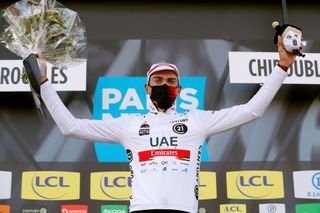 CHIROUBLES FRANCE MARCH 10 Podium Brandon Mcnulty of United States and UAE Team Emirates White best young jersey Celebration during the 79th Paris Nice 2021 Stage 4 a 1875km stage from ChalonSurSane to Chiroubles 702m Mask Covid safety measures Trophy Flowers ParisNice on March 10 2021 in Chiroubles France Photo by Bas CzerwinskiGetty Images