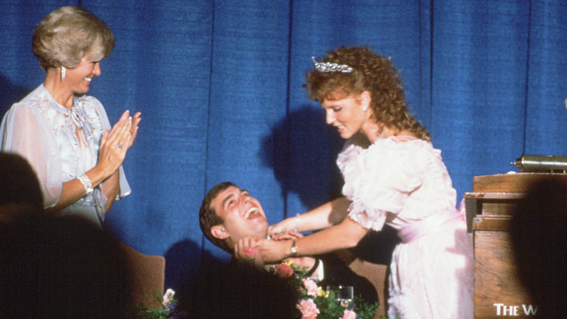 Sarah Ferguson pretending to strangle Prince Andrw