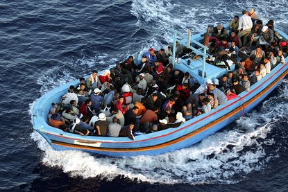 Migrants face danger crossing the Mediterranean.
