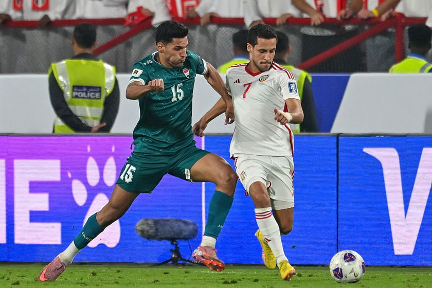 ABU DHABI, UNITED ARAB EMIRATES - NOVEMBER 13: Ahmed Yahya (L) of Iraq competes against Ali Saleh during the first match of the fifth round of the 2026 FIFA World Cup Asian Qualifiers between United Arab Emirates and Iraq at the Mohammed bin Zayed Stadium in Abu Dhabi, United Arab Emirates, on November 13, 2025. (Photo by Waleed Zein/Anadolu via Getty Images)