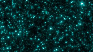 An image of the sky in infrared light, taken by NASA's Spitzer Space Telescope. The image shows the same patch of sky as seen in the image above, but without the known infrared sources removed.