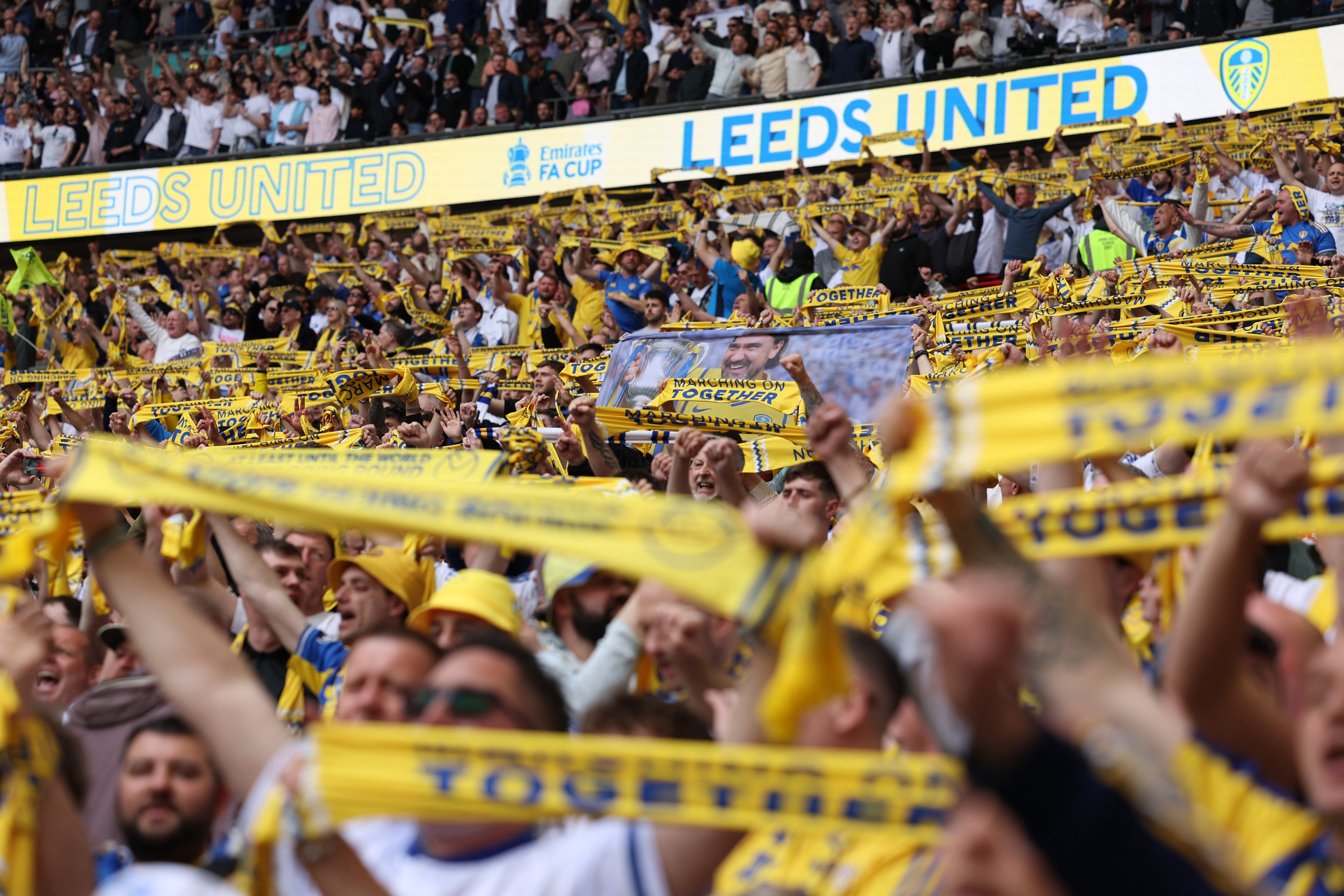 Leeds fans cheer on their team ahead of the English FA Cup semi final football match between Chelsea and Leeds United at Wembley stadium in London, on April 26, 2026. (Photo by Adrian Dennis / AFP) / NOT FOR MARKETING OR ADVERTISING USE / RESTRICTED TO EDITORIAL USE